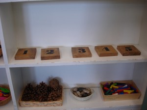 Natural materials appear in the math centre too. The numbered blocks are coasters I found at Winners!
