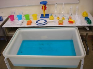 I opted for a large variety of materials here - scoops, cups of various shapes and sizes, squirters and pumps as well as whimsical objects like boats and rubber duckies.