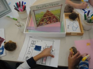 Students continue adding to the plans they designed in the computer lab.