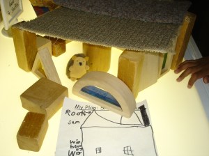 "Inside Snuffles house are so many toys. I used the square blocks with the colours because you can see through them. They are windows."