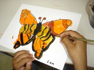 Representing our butterflies with beautiful watercolour paintings. The children worked very hard to create symmetrical designs on the butterfly wings.