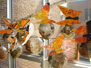 Our butterflies were clipped to our chrysalises and hung from a branch suspended from the ceiling.
